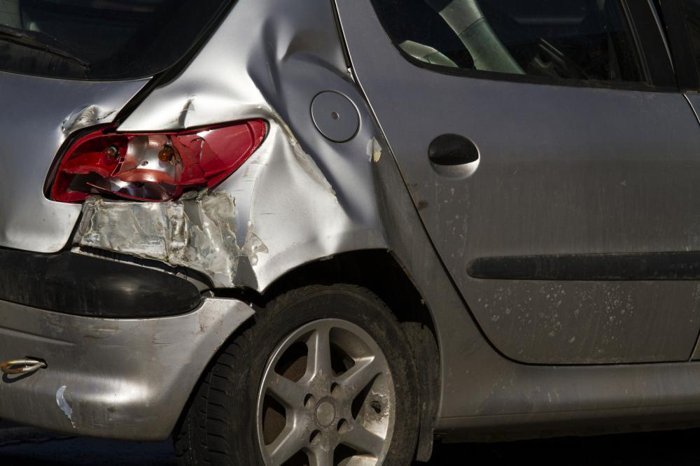 A car damaged from the back after a rear-end collision